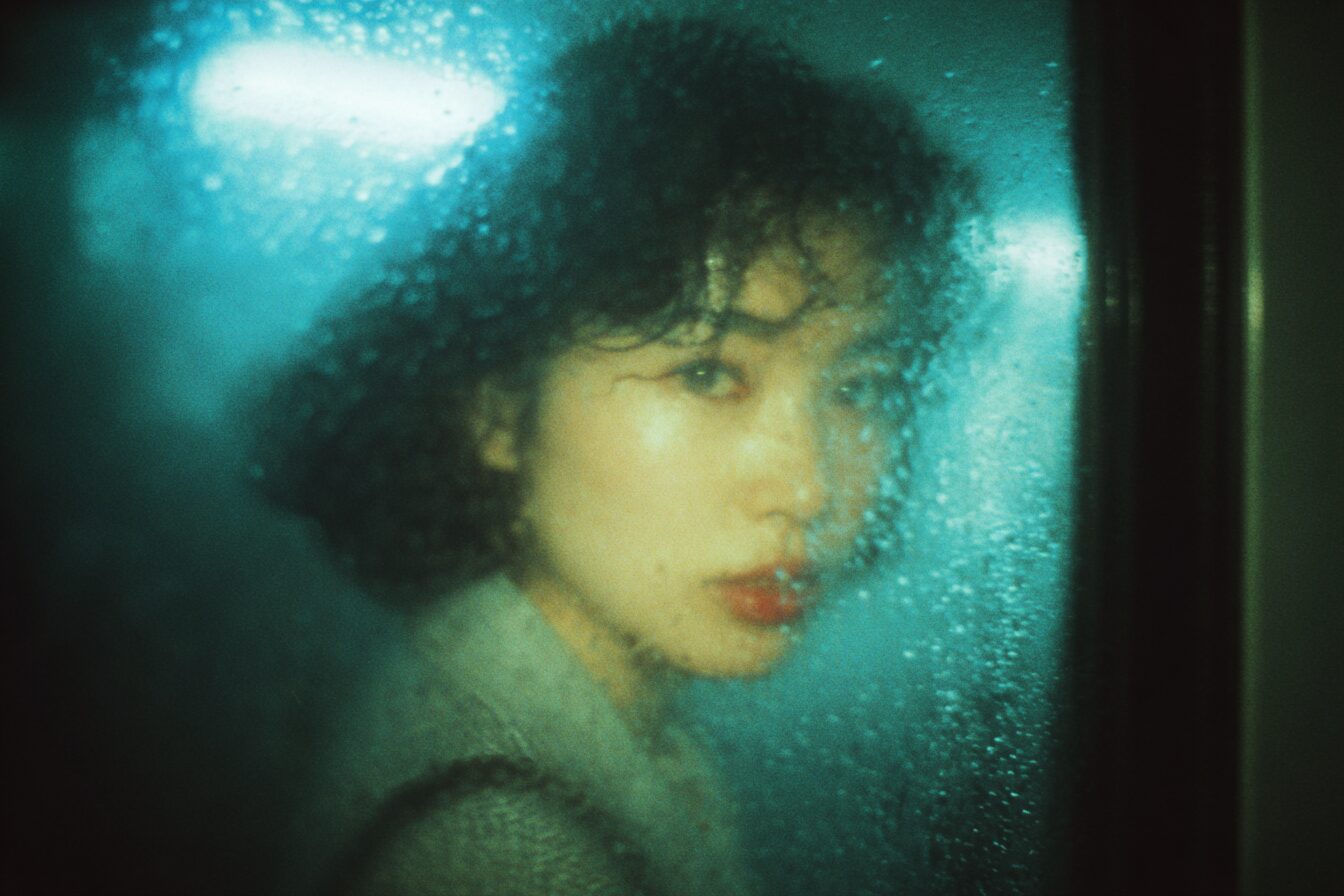 showa_era_1980_melancholic_japanese_woman_gazing_to_camera_bl_797a9d3f-363c-4434-aa57-b33510ea41a2_3
